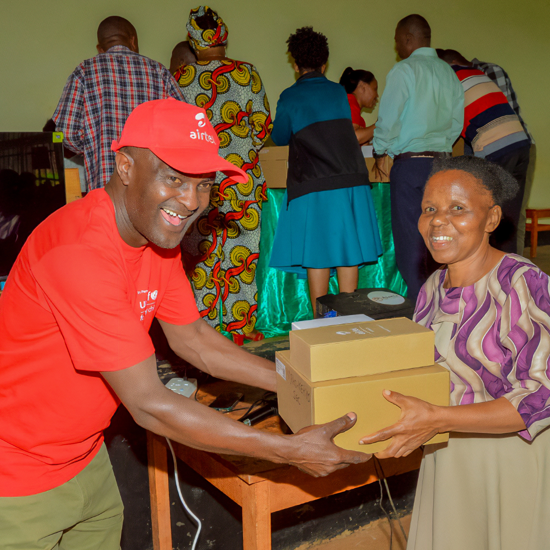 Adam Ally a teacher from Tanzania receiving internet routers donated by Airtel Africa