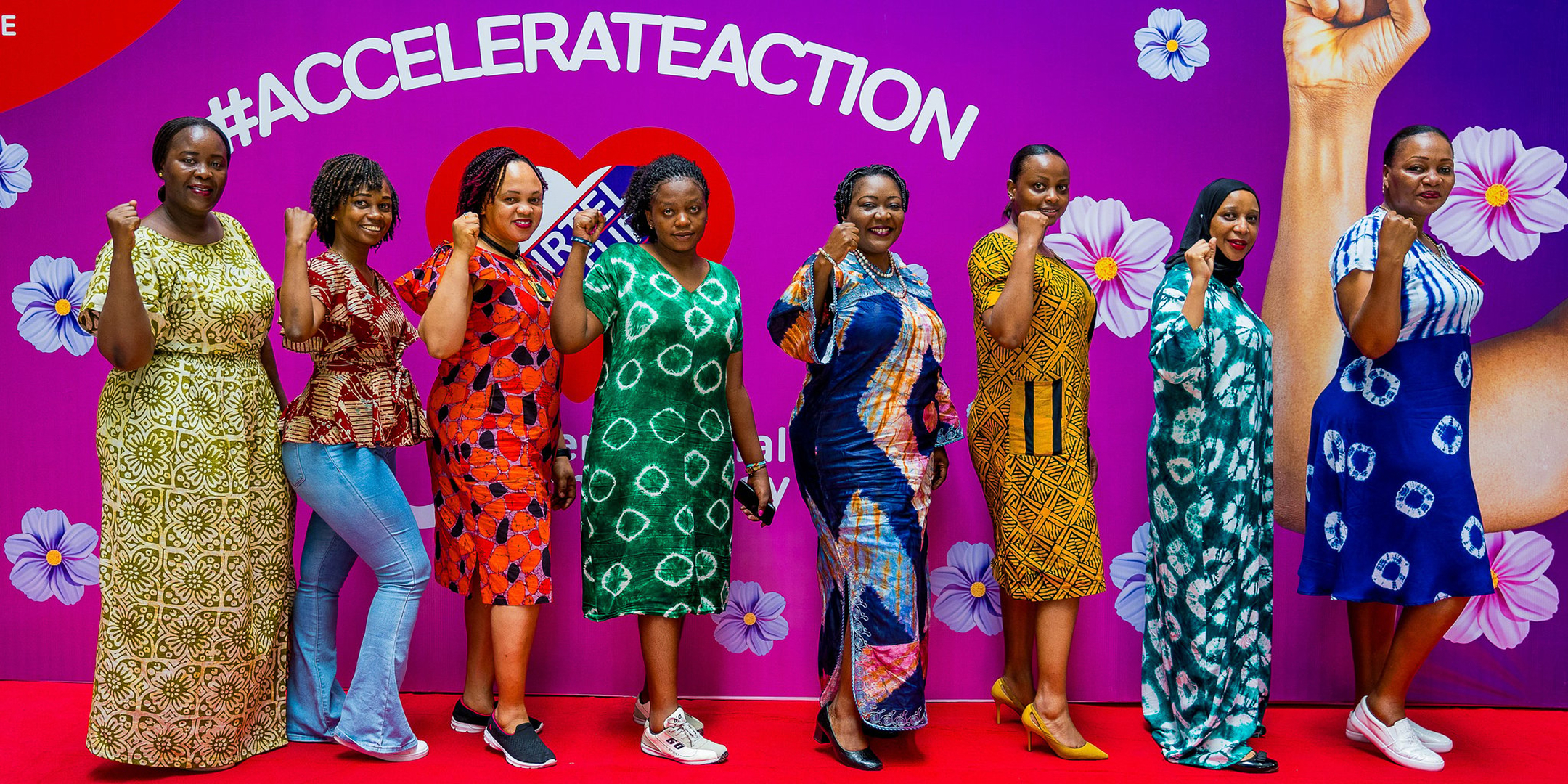 Group of women promoting our 'accelerate action' theme which reaffirms our commitment to empowering women as catalysts of economic growth across the continent and key drivers of the future of the business.