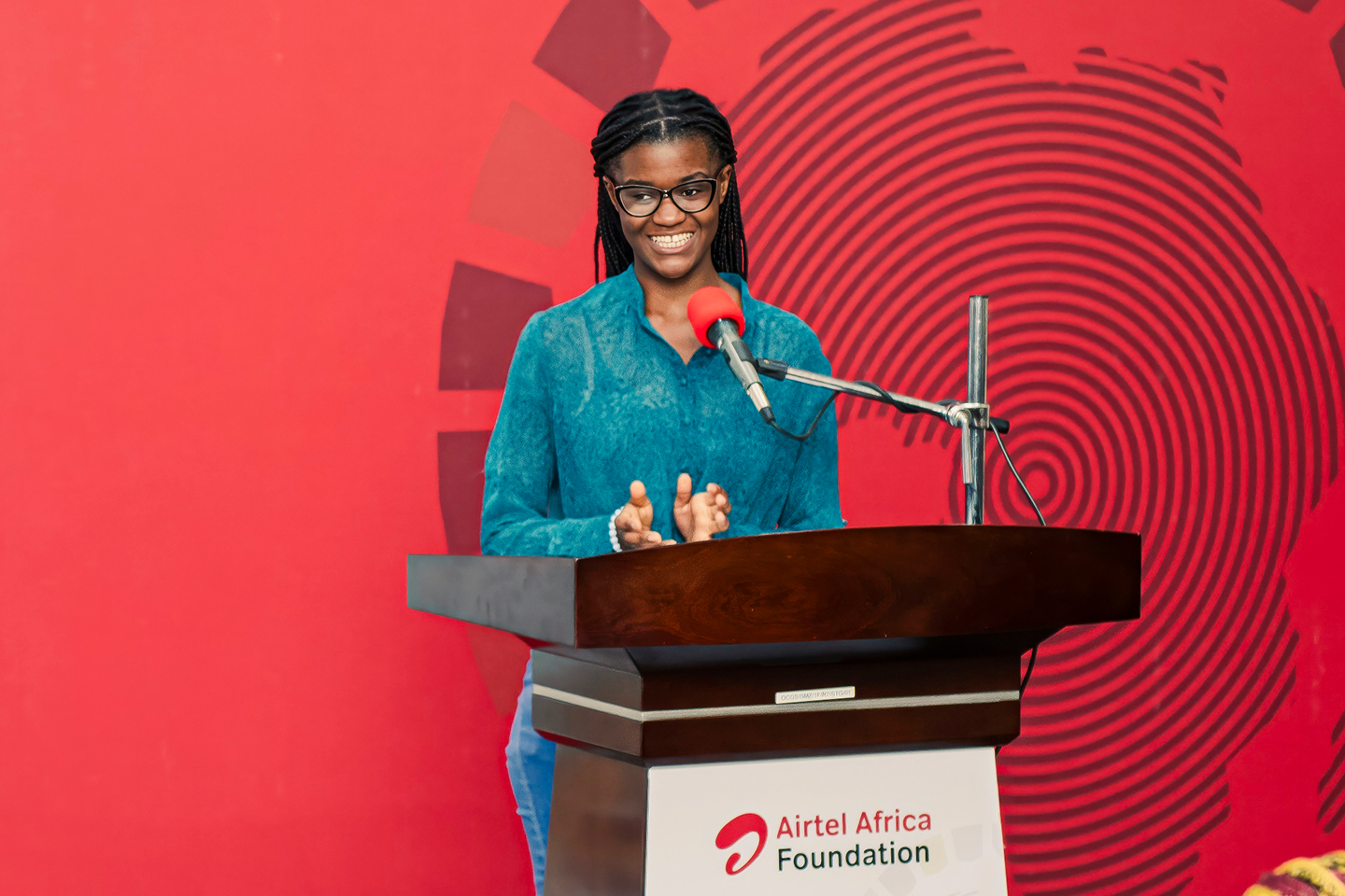 Young woman speaking at Airtel Africa fellowship programme event