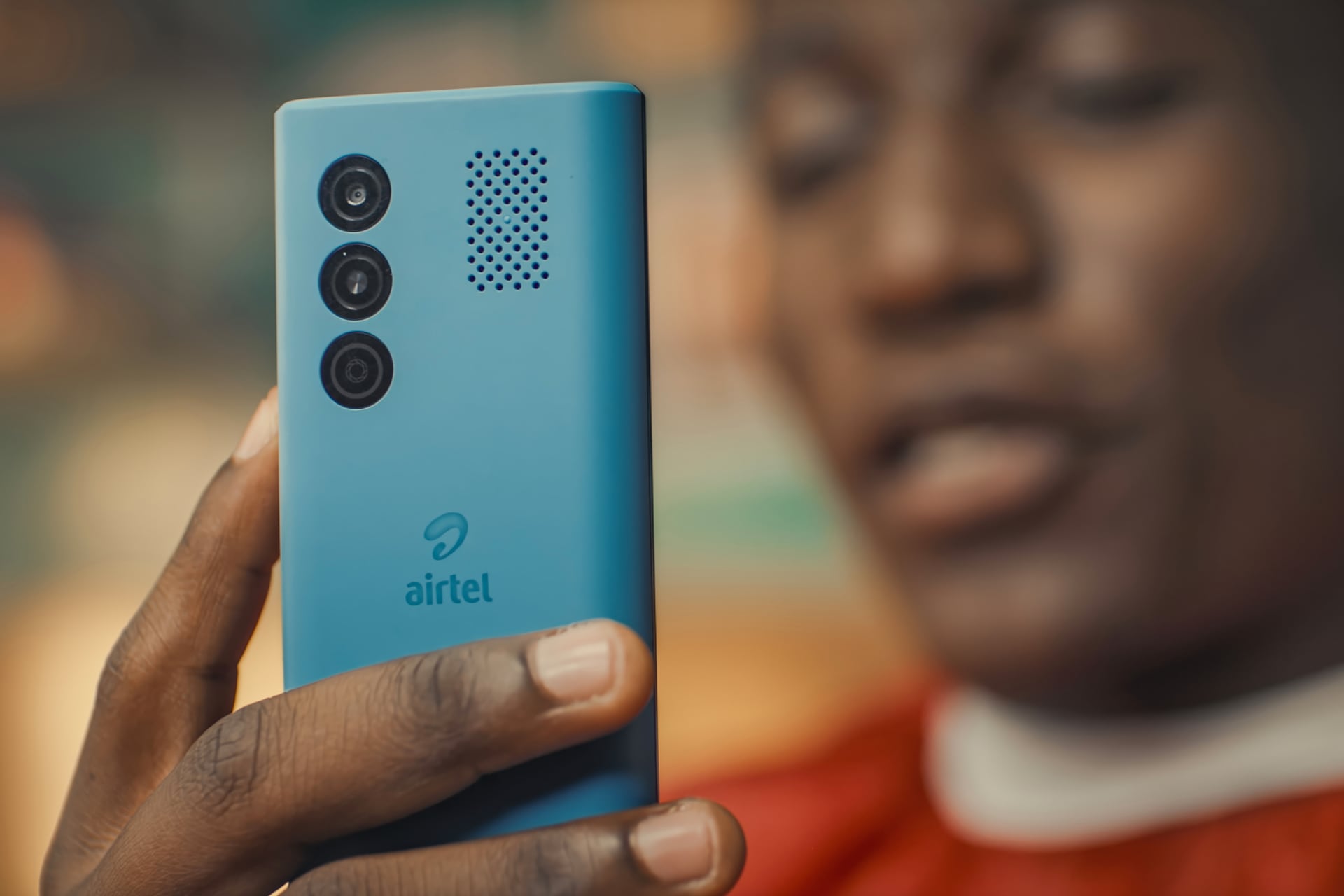 Man looking at a phone in his hand