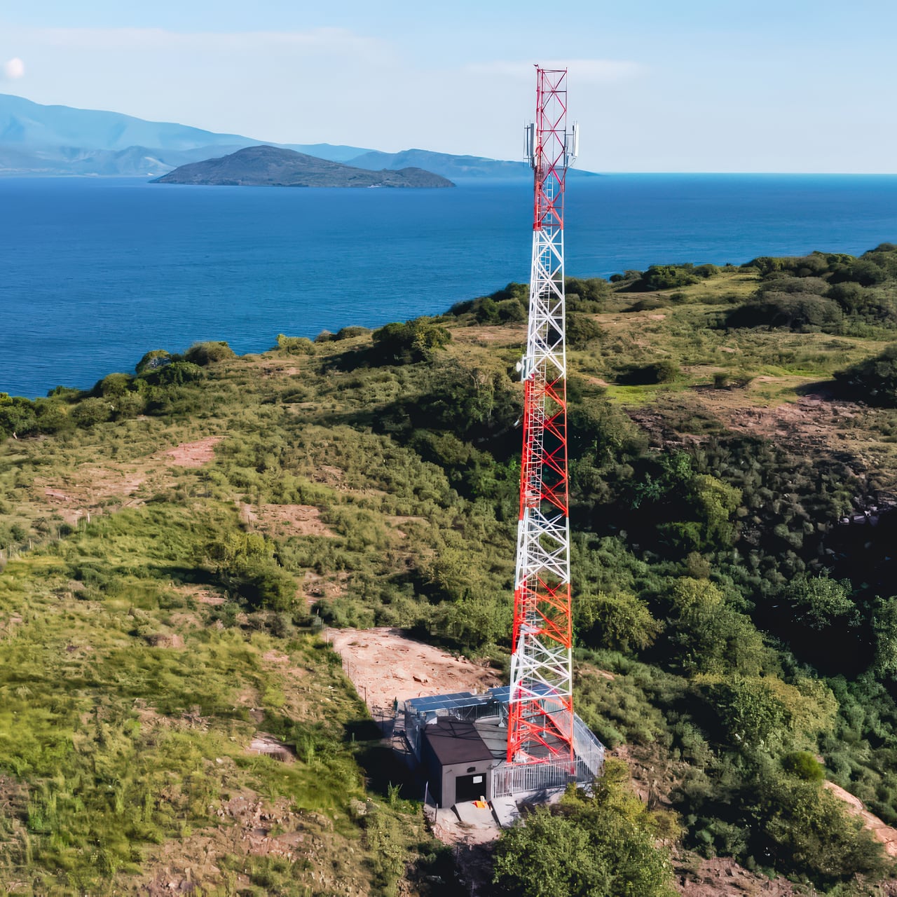 Aerial view of a cell tower near the ocean